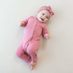 KYTE BABY ZIPPERED ROMPER IN APPLE BLOSSOM