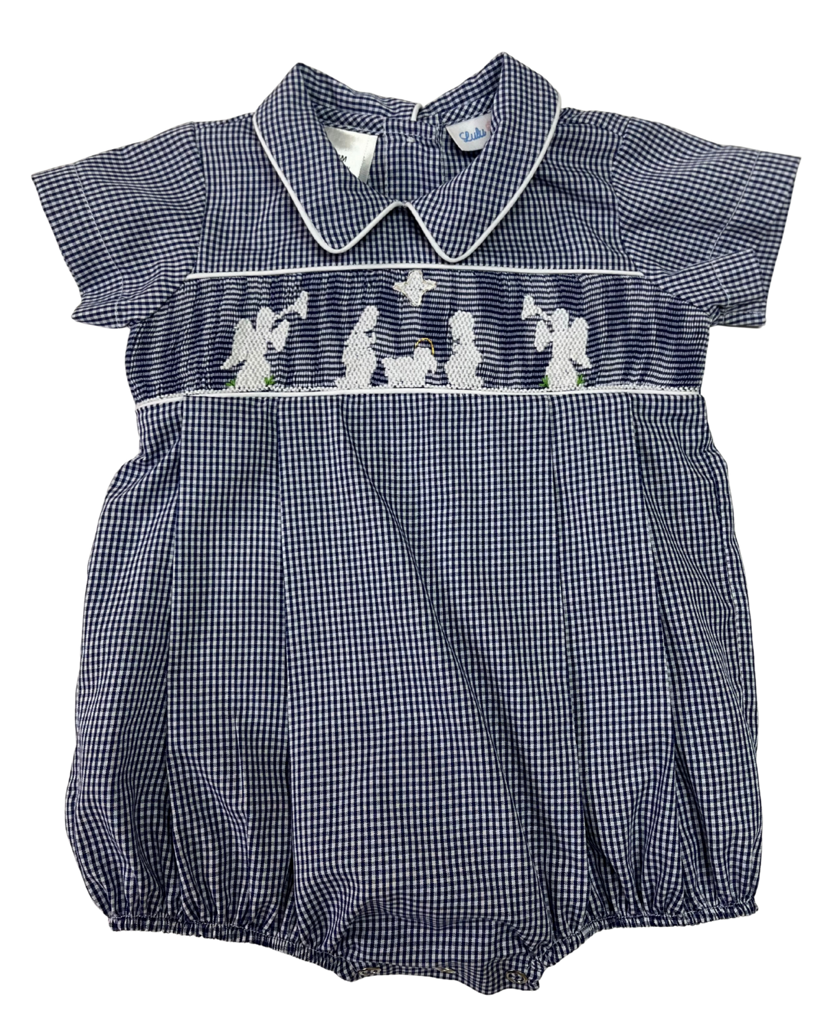 A navy and white gingham baby romper with white smocked angel figures across the chest, featuring a pointed collar and short flutter sleeves.