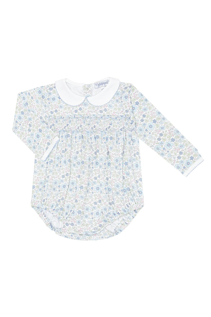 Floral-patterned baby dress with a white collar on a white background