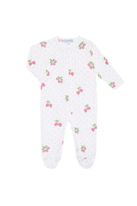 White baby onesie with cherry pattern on a white background