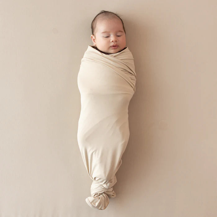 KYTE BABY SWADDLE BLANKET  BISQUE