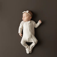 KYTE BABY ZIPPERED FOOTIE IN BISQUE