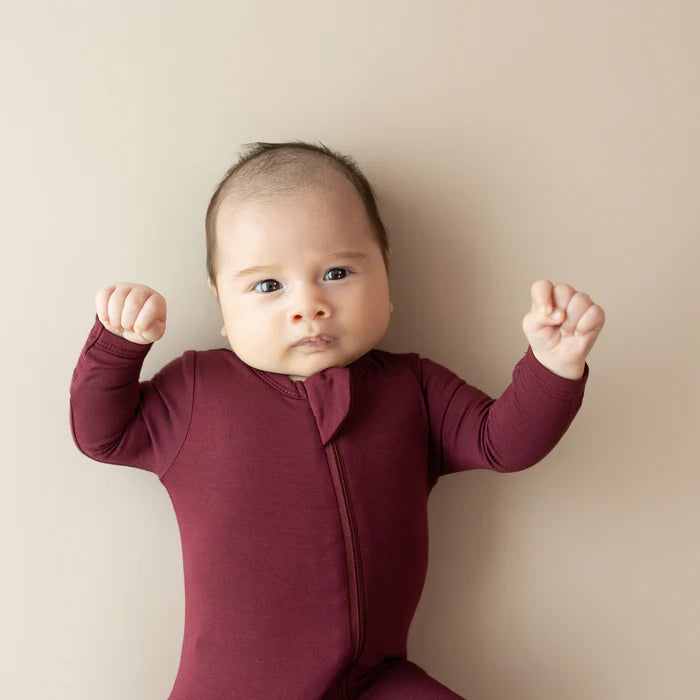 KYTE BABY ZIPPERED FOOTIE IN BURGUNDY