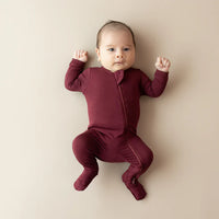 KYTE BABY ZIPPERED FOOTIE IN BURGUNDY