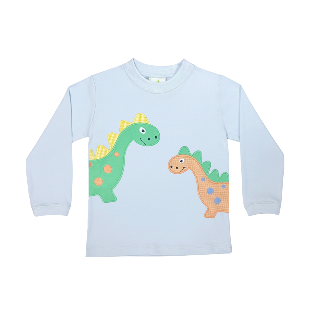 A light blue long-sleeve baby t-shirt featuring two colorful embroidered dinosaur designs on the front, displayed against a solid white background.