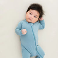 KYTE BABY ZIPPERED ROMPER IN DUSTY BLUE