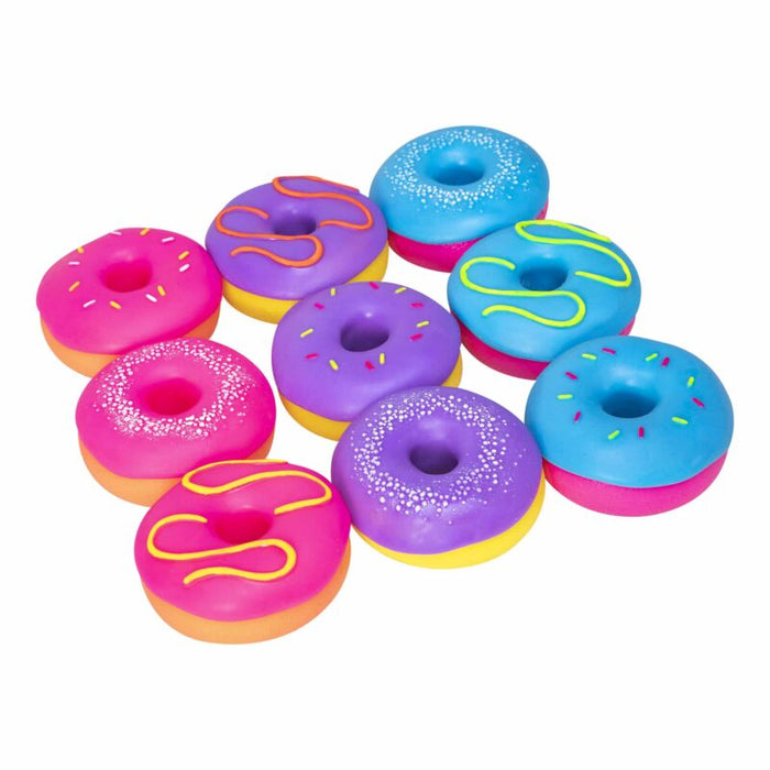 Colorful donut-shaped toys on a white background