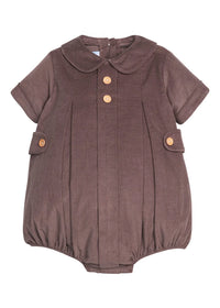 A short-sleeve baby romper in a textured brown corduroy fabric, featuring a Peter Pan collar, three decorative buttons down the front, and flap pockets on the sides with matching buttons.