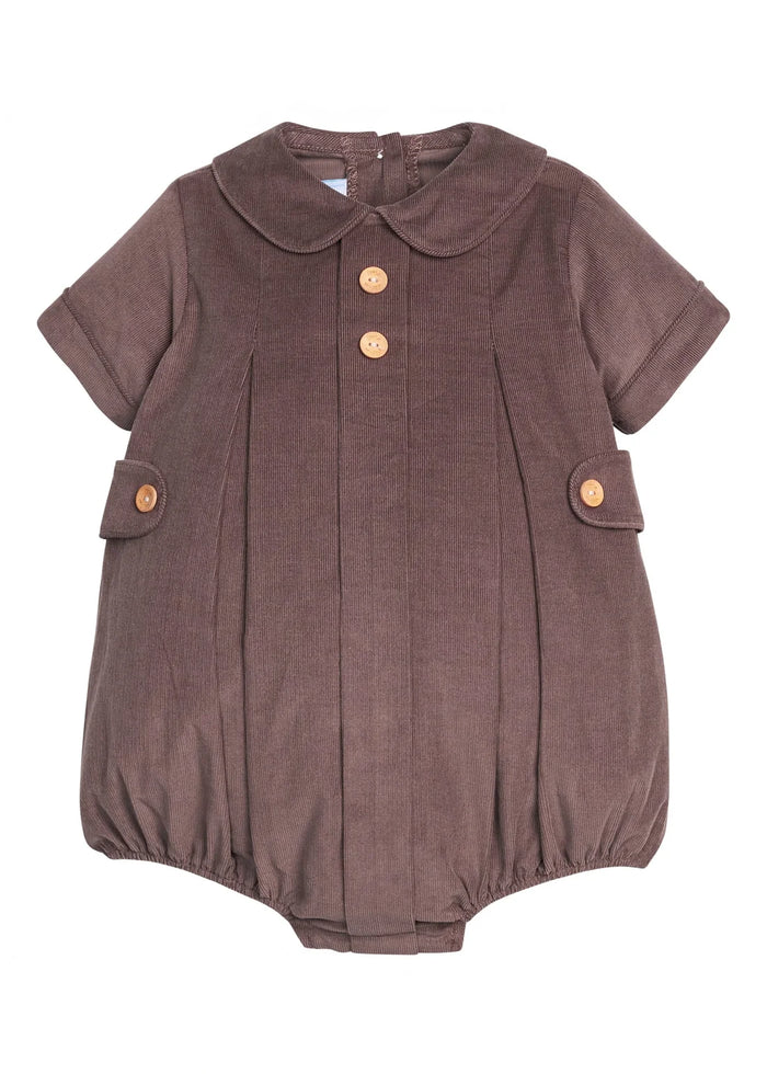 A short-sleeve baby romper in a textured brown corduroy fabric, featuring a Peter Pan collar, three decorative buttons down the front, and flap pockets on the sides with matching buttons.