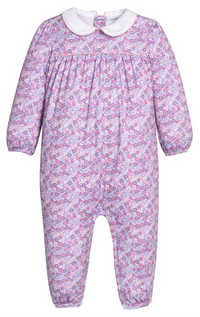 Floral baby onesie with a white collar on a white background