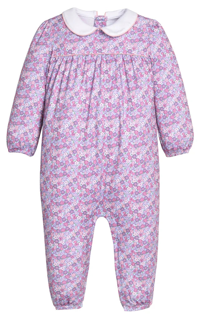 Floral baby onesie with a white collar on a white background
