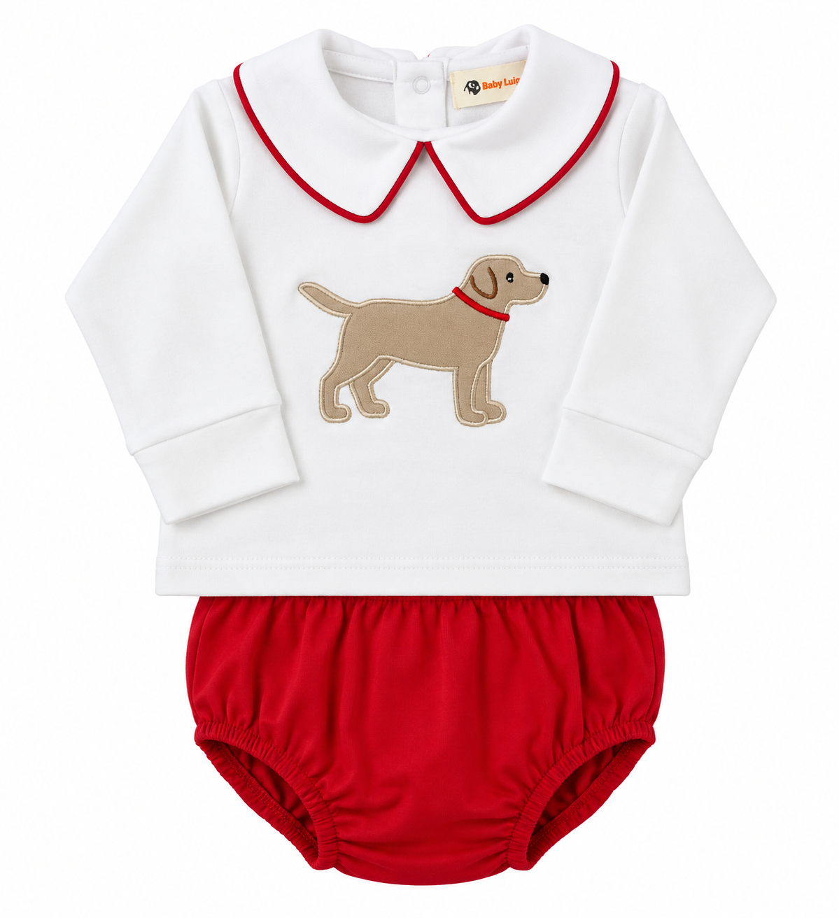 A baby two-piece outfit featuring a white long-sleeve top with a red-trimmed Peter Pan collar and an embroidered tan dog with a red collar, paired with red bloomers.