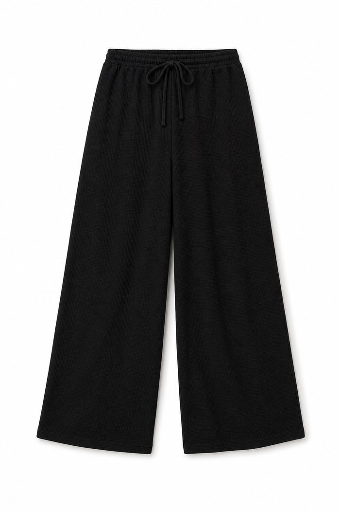 Black wide-leg cropped pants with an elastic drawstring waist, shown flat against a white background.