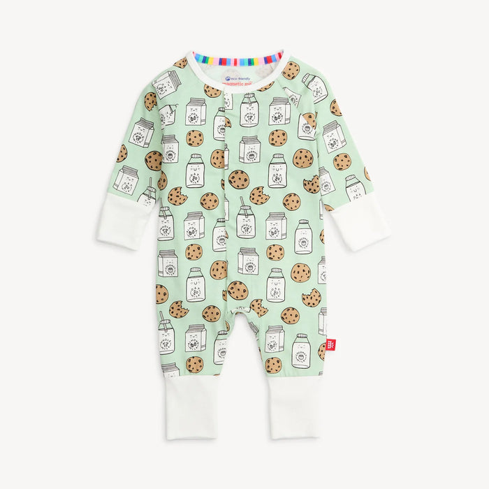 Children's onesie with cookies and milk pattern on a light green background