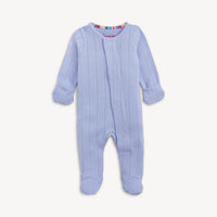 Blue baby onesie with a colorful neckline on a white background