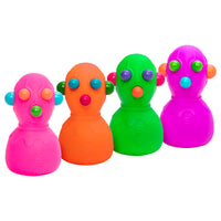 Four colorful, egg-shaped sensory toys in pink, orange, green, and purple, arranged side-by-side on a solid white background.