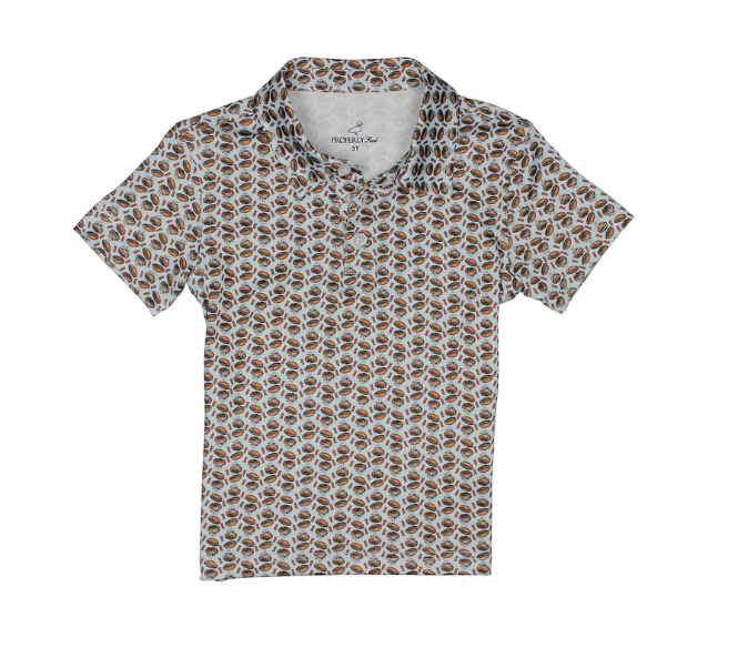 A short-sleeve polo shirt with an all-over repeating geometric pattern in brown, beige, and white, displayed flat against a white background.