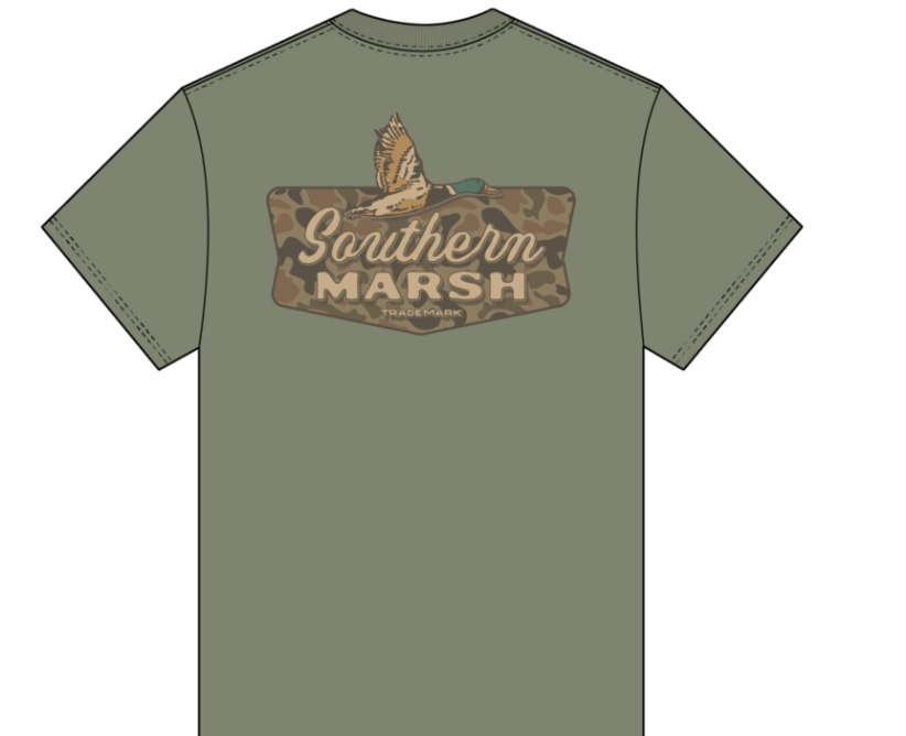 An olive green short-sleeve t-shirt shown from the back, featuring a large graphic print of a duck hunting scene with a duck on a camouflage background and the text 'Southern Marsh' and 'tradition hunting'.