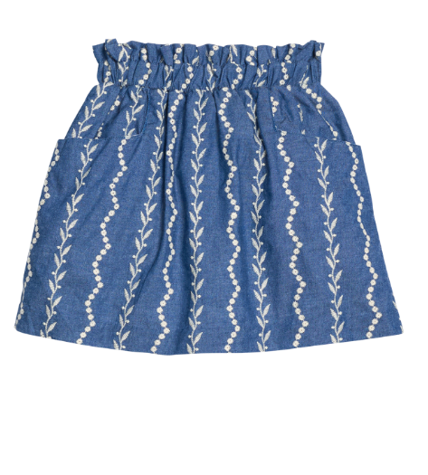 A blue denim-like skirt with an elastic waistband and vertical white embroidered leafy vine patterns, shown flat against a white background.