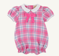 A pink plaid baby romper with a white Peter Pan collar and a matching pink bow at the chest, displayed on a clean off-white background.