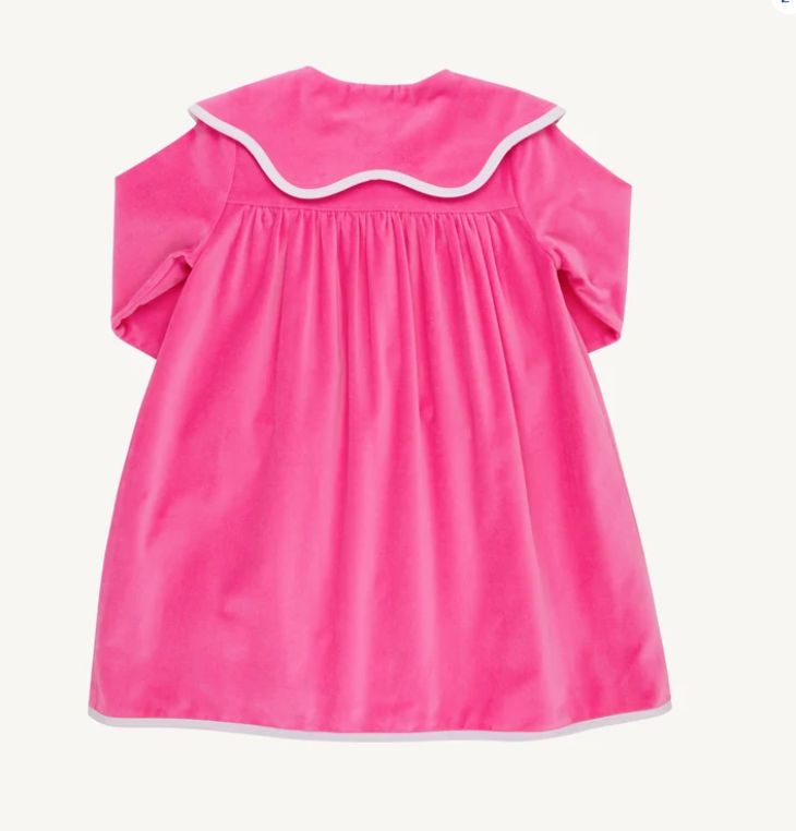 Bright pink short-sleeve dress shown from the back, featuring a wide scalloped collar with white trim and white piping along the hem, photographed on a plain light background.