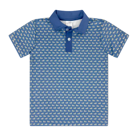 A short-sleeve polo shirt for kids, featuring a medium blue base with a repeating white pattern of small boats, a solid blue collar, and a matching blue three-button placket.