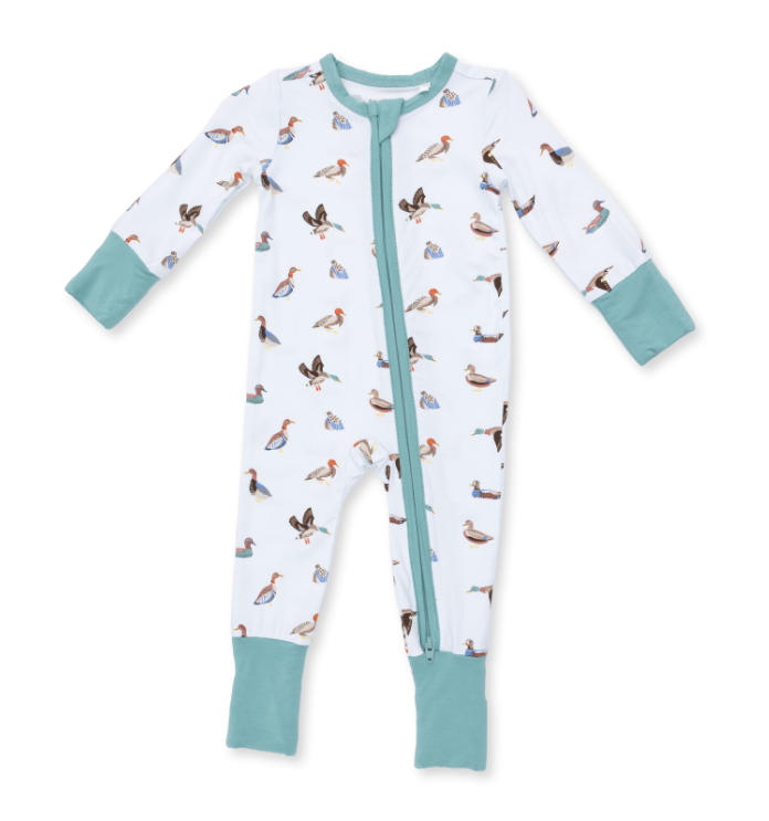 A baby long-sleeve footed sleeper with a white background, printed with colorful birds, and finished with solid teal cuffs, collar, and zipper trim.