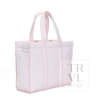 A light pink and white gingham quilted tote bag with two top handles, shown from a three-quarter angle on a white background with a 'TRVL design' watermark.