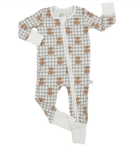 A baby long-sleeve footed sleeper with a white and gray plaid pattern, featuring a repeating brown teddy bear print and a white zipper down the front.