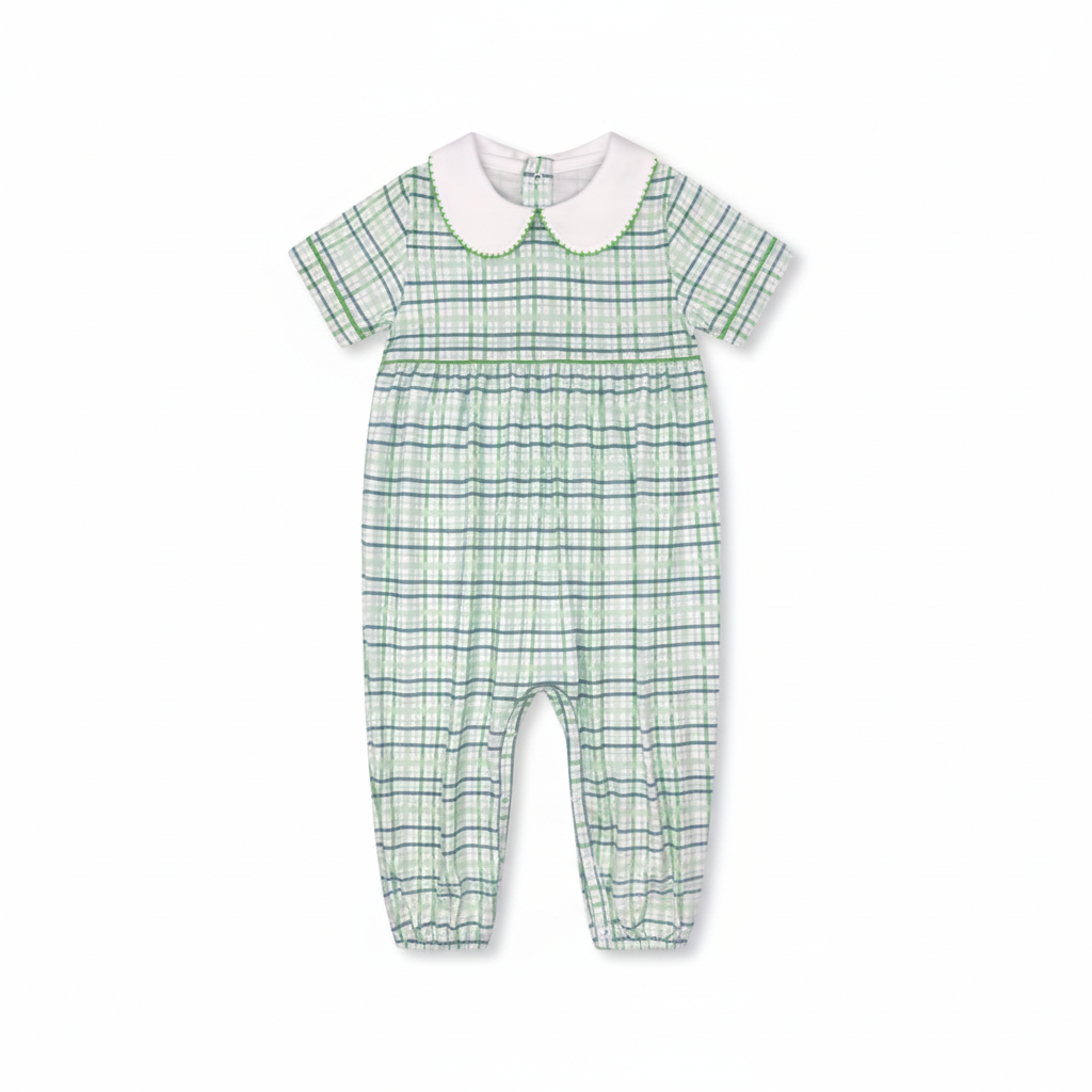 A baby romper with a green and white plaid pattern, featuring a white Peter Pan collar with green trim, displayed on a solid gray background.