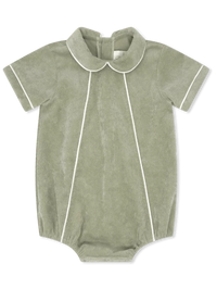 A baby short-sleeve romper in sage green velour with white piping details, featuring a Peter Pan collar, laid flat on a white background.