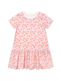 A toddler girl's short-sleeve dress in light pink with a repeating orange and white candy print, featuring a ruffled hem and a white inner collar, shown against a plain white background.