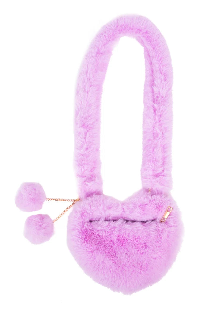 Purple fuzzy ear muffs with cherry decorations on a white background