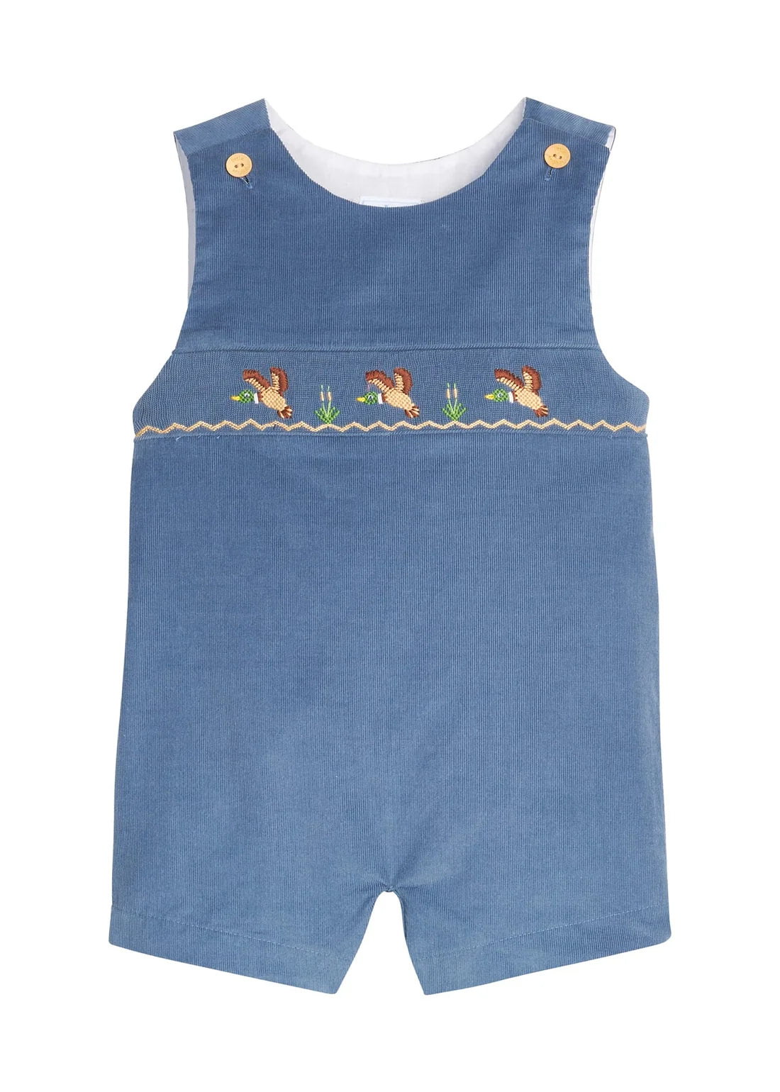 A baby's blue denim smocked romper with embroidered ducks and reeds across the chest, featuring gold snap buttons on the shoulder straps and a white inner collar, shown on a plain white background.