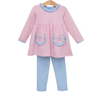 Pink and blue children's outfit with a dress and leggings on a white background