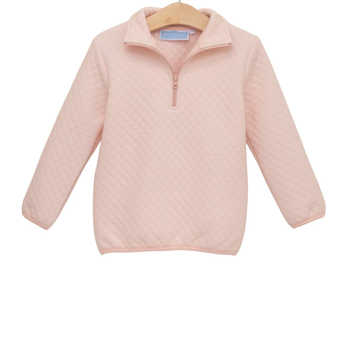 A light pink quilted long-sleeve quarter-zip pullover sweater hanging on a wooden hanger against a plain white background.
