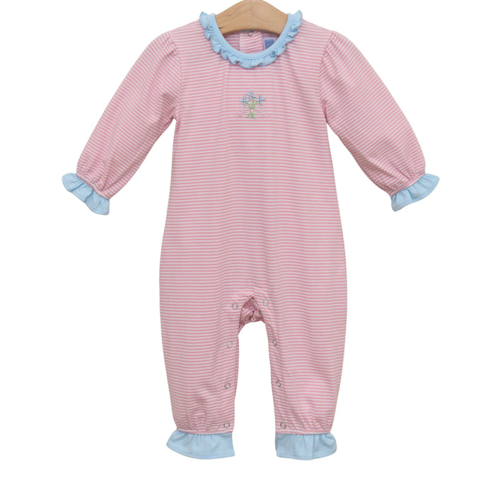 Pink and blue striped baby onesie on a hanger with a white background