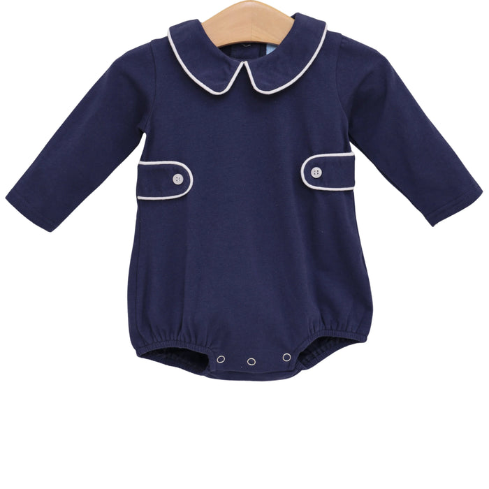 Navy blue baby romper with white trim