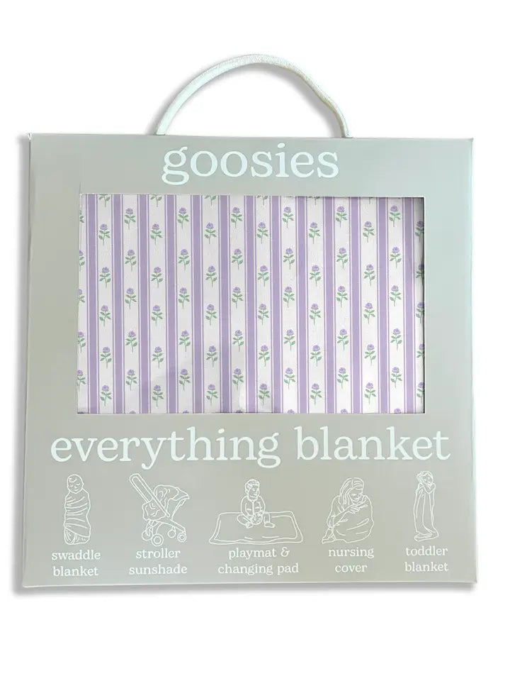 A packaged baby blanket set in a pale sage green box with a white carrying handle. The box reads 'goosies everything blanket' and shows a window with lavender and white striped blankets with a small floral print.