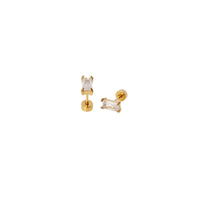 A pair of gold stud earrings with rectangular clear baguette-cut gemstones, shown from two angles on a plain white background.