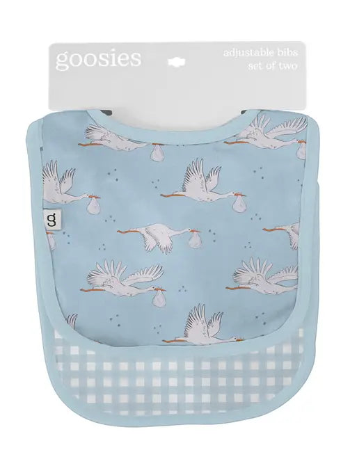 Set of two baby bibs with bird pattern on a blue background, brand 'goosies' visible.