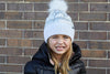 KIDS FAUX FUR PUFFER POM BEANIE WHITE SILVER