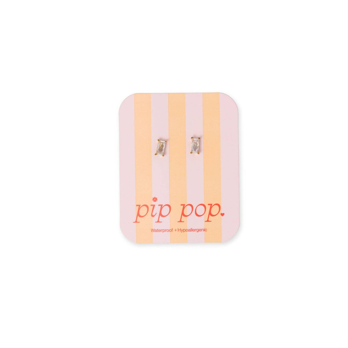 A pair of silver-toned hoop earrings displayed on a pink and peach striped backing card with the brand name 'pip pop.' printed in red at the bottom, set against a plain white background.