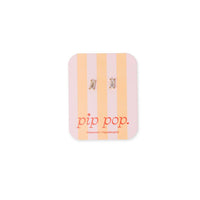 A pair of silver-toned hoop earrings displayed on a pink and peach striped backing card with the brand name 'pip pop.' printed in red at the bottom, set against a plain white background.