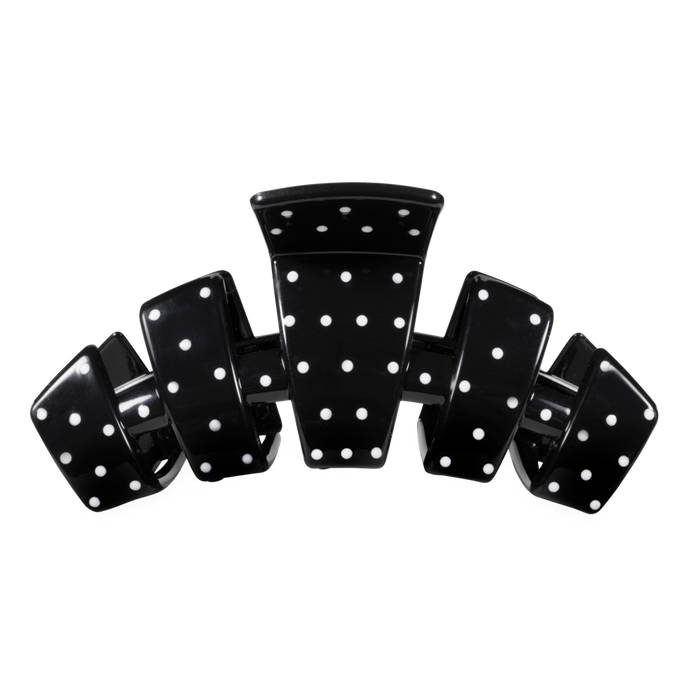 Black dice with white dots arranged in a scattered manner on a white background