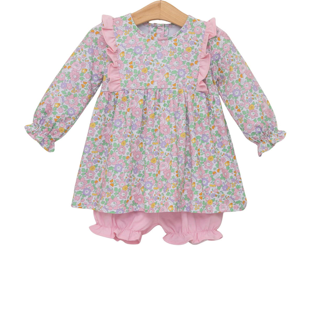 Floral dress with pink ruffles on a white background
