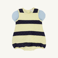 A baby sleeveless quilted romper with horizontal navy blue and pale yellow stripes, featuring light blue padded shoulder panels, shown against a plain off-white background.