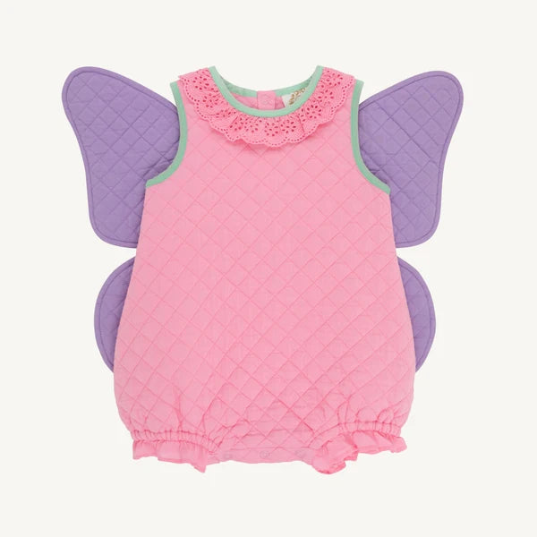 A baby's pink quilted romper with purple wings and a mint green collar, displayed flat against a light cream background.