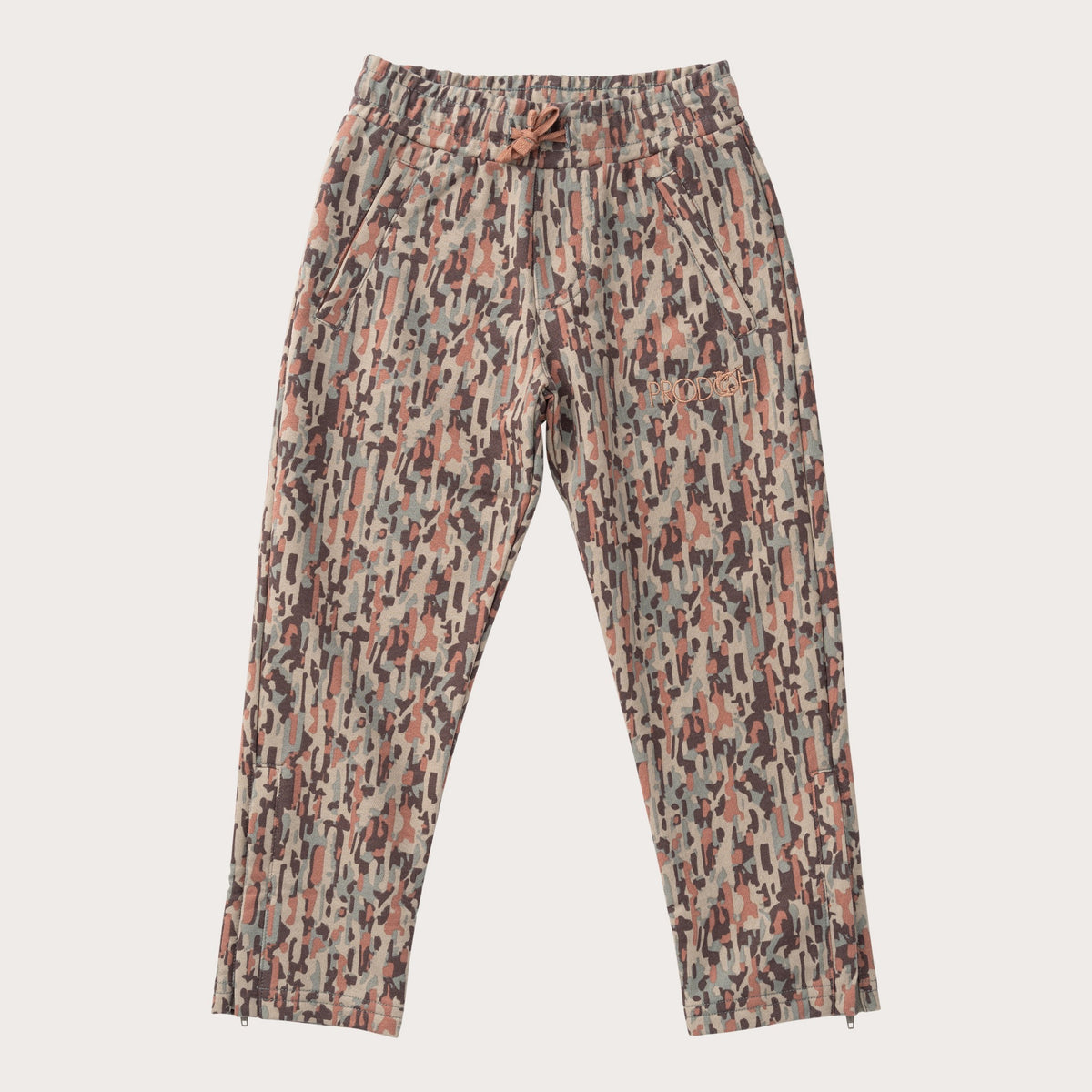 Floral patterned pants on a light gray background