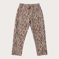 Floral patterned pants on a light gray background